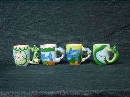 36 of Porc. Mug W/ 4 Asst. Designs 6pc/ib 36pc/cs