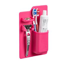12 of Pink Mighty Silicone Holder For Toothbrush And Small Bathroom Items